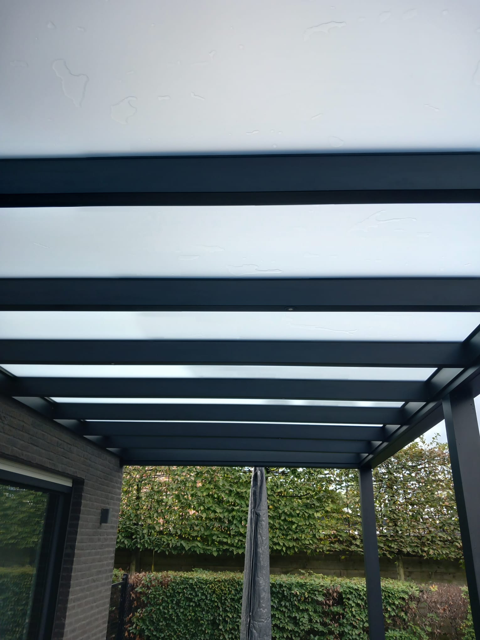 Carporten reiniging service door Aqualou